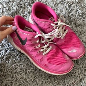 pink nike running shoes